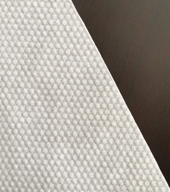 Large cross embossed spunlace substrate