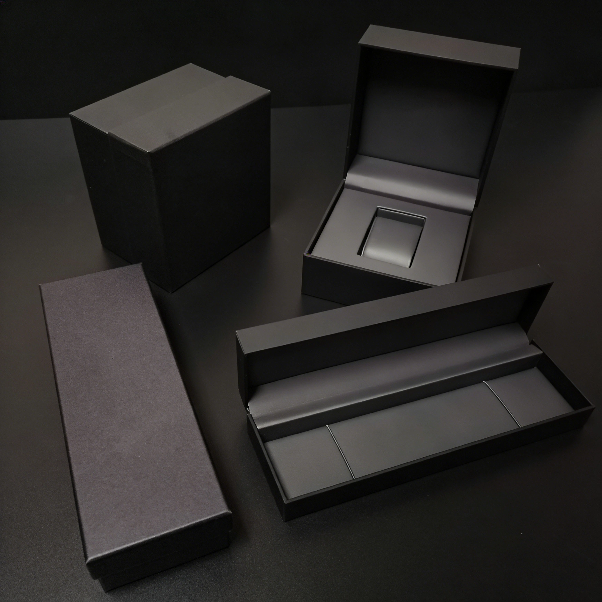 Open black single watch box showing the interior support and presentation structure