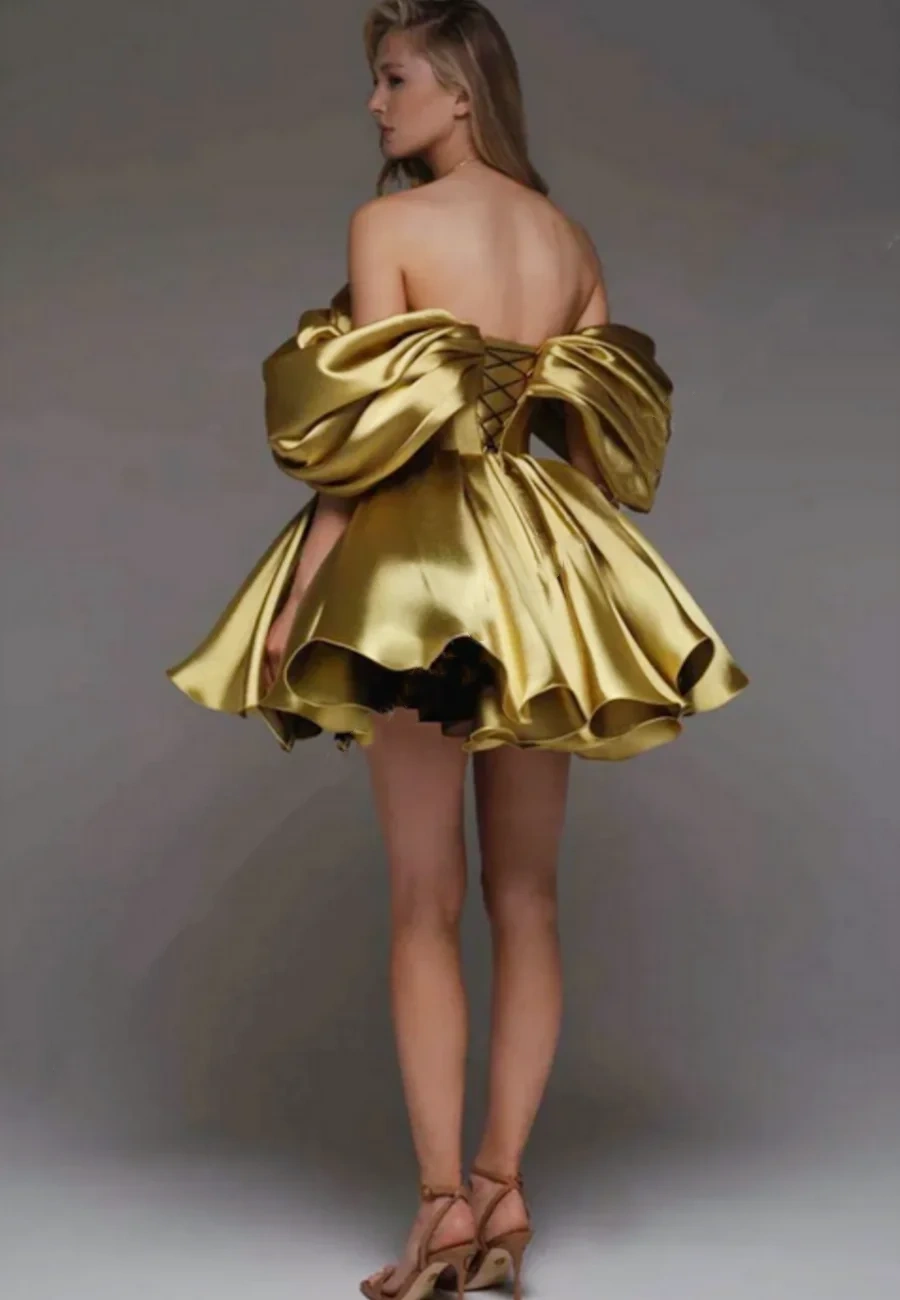 Off-shoulder satin A-line mini dress — side view showing the A-line skirt drape
