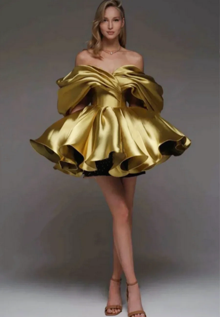 Off-shoulder satin A-line mini dress in motion showing the mini hem and A-line drape