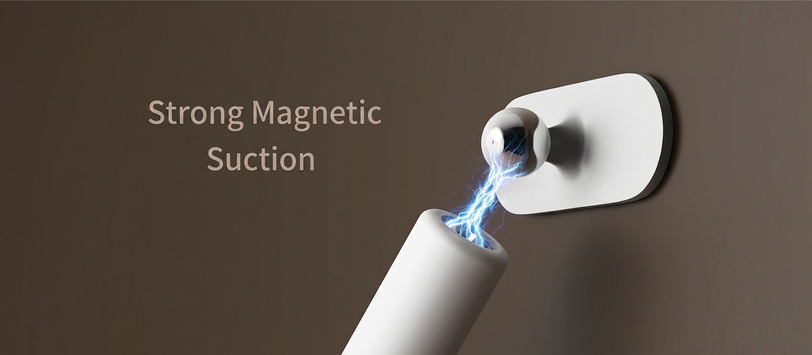 Close up of a modular rechargeable desk lamp utilizing strong magnetic suction to connect with a wall mounted metal ball joint.