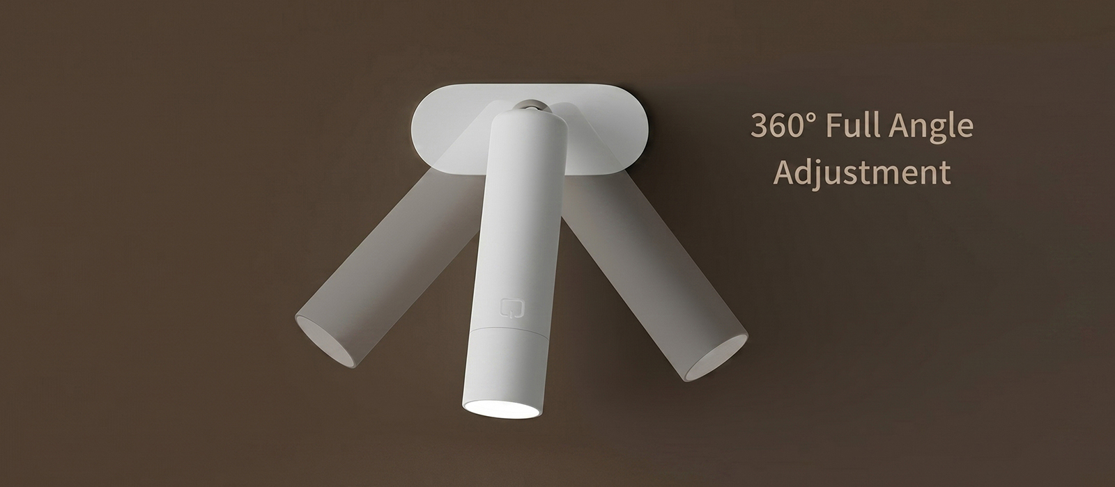 A 3D product rendering illustrating the 360-degree full angle adjustment feature of a minimalist white portable desk lamp with multiple motion blur shadows on a solid mocha brown background