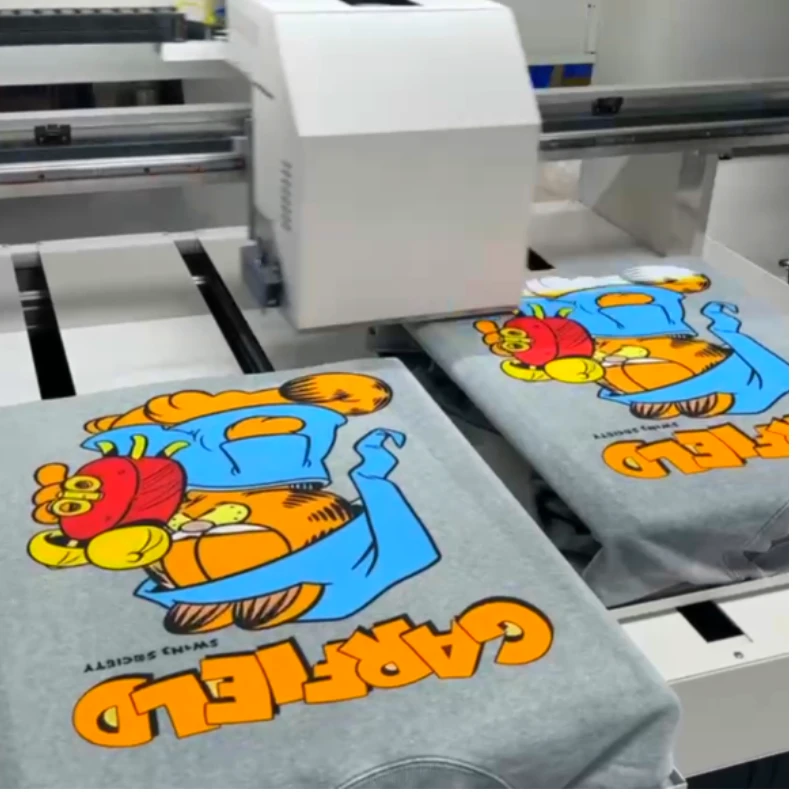 Cosmox multi table DTG Printer print on gray t-shirt