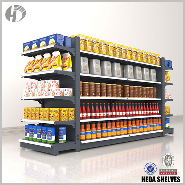 Original HEDA product merchandising illustration showing black gondola shelving filled with packaged groceries, bottles, food cartons and merchandise on an end-facing shelf