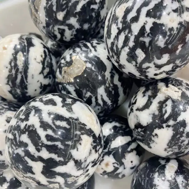 Zebra stone sphere