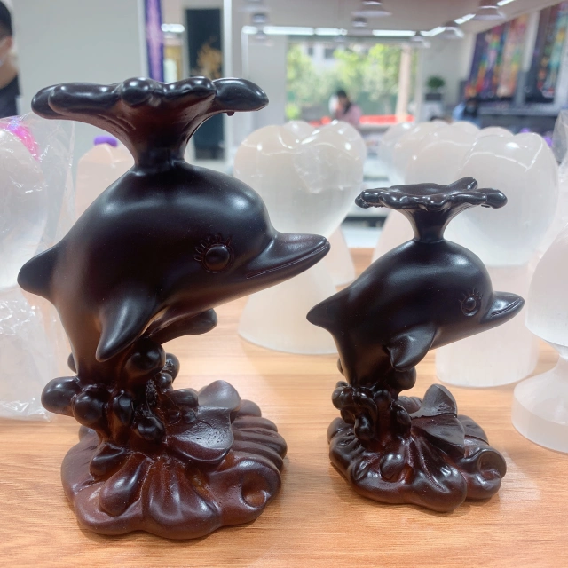 Dolphin sphere stand