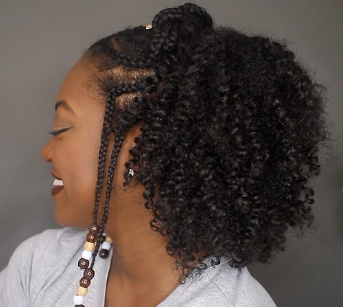 curly hair with in front of ear braids