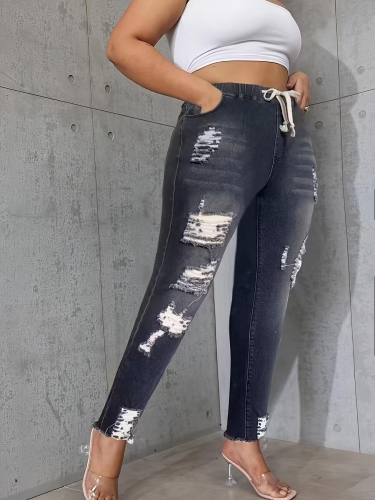 Plus size distressed drawstring jeans