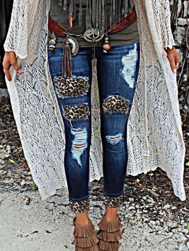 Charming torn and tattered leopard print patch rolled edge denim leggings