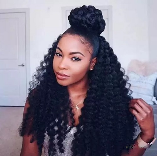 high bun qith half down deep wave hair