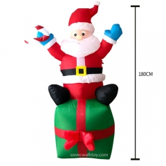Christmas Father Sitting on Present Inflatable Decoration