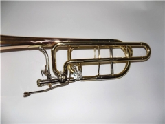 Professional Bb/F/Eb/D Bass trombone China Yellow brass Musical instruments OEM