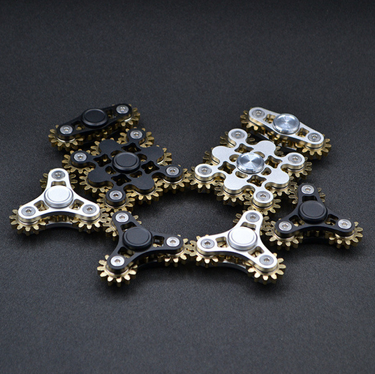 Fist of the nine teeth linkage fingertips Spinner
