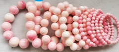 Pink Queen Conch & Chequ Shell Bracelet: Natural Beaded Strand