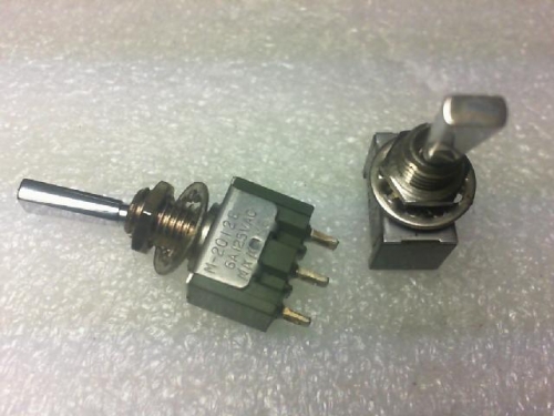 The toggle switch. Japan NKK/M--2012E/ button switch. About two young