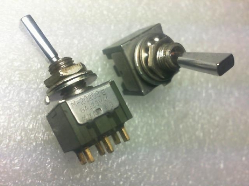 The toggle switch. Japan NKK/M--2022E/ button switch. About two young