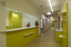 White and green clinic reception desk