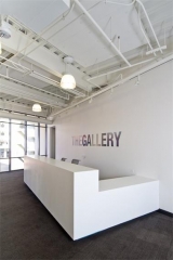 Big gallery white reception counter