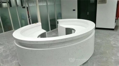 Round artificial stone large reception desk on the hall