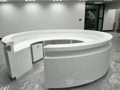 Round artificial stone large reception desk on the hall