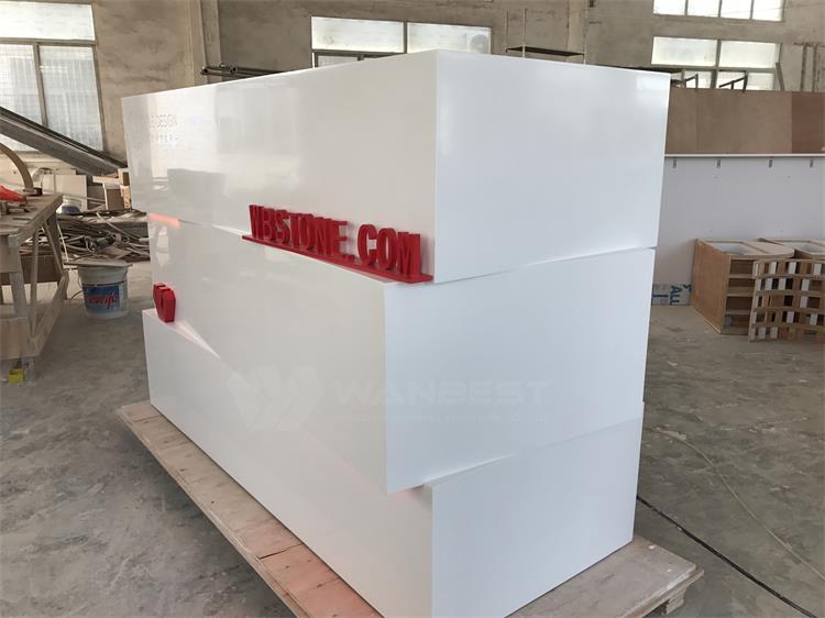 The side of  corian front counter