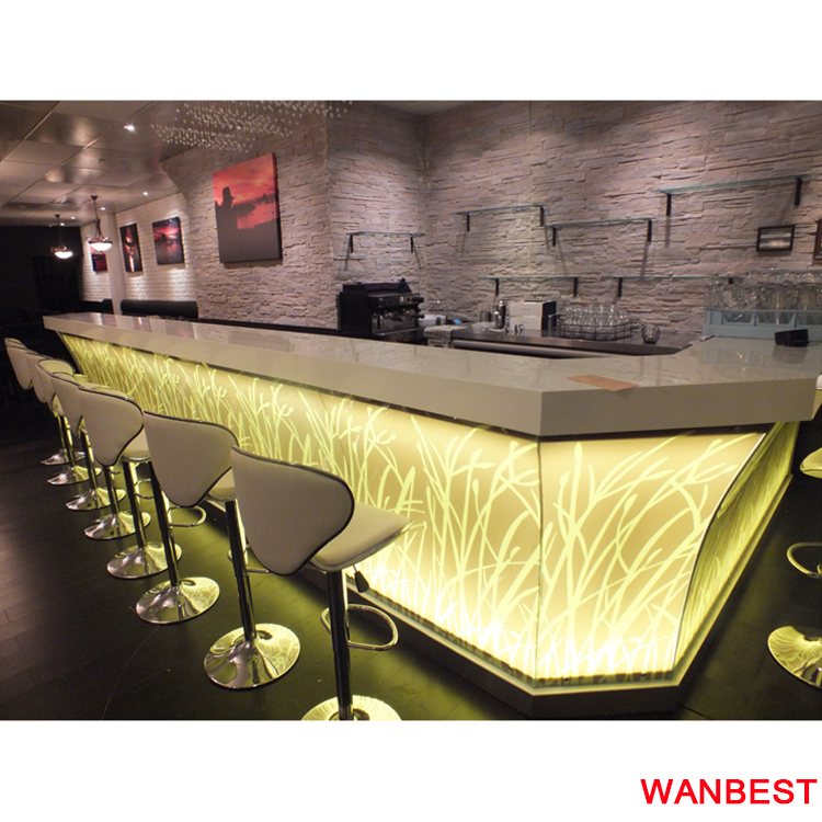 The body of bar counter is translucent stone with grass design  