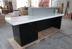 Gray and black Company salon front counter desk table