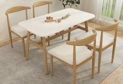 modern white solid surface dining room table with chairs