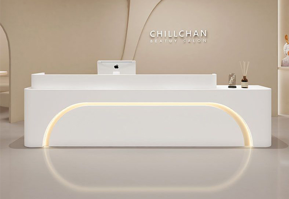 White simple marble  nail salon hotel reception desk