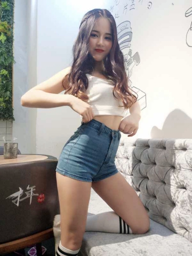 High waist and hips, wearing denim tight-fitting shorts