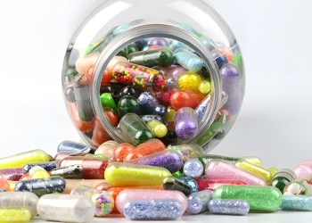 Various hard capsules in bottles