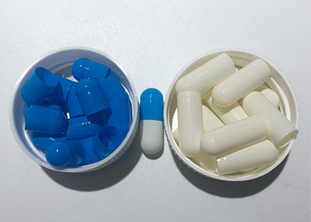 Blue and white empty capsules