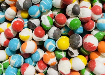 Assorted freeze-dried candy pieces (heart, square shapes) , manufactured via a pilot-scale vacuum freeze dryer to retain flavor
