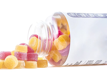 A small bottle of gummy candies