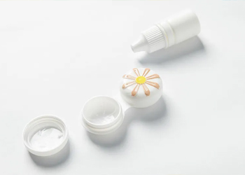 Eye drops are right beside the contact lens case.