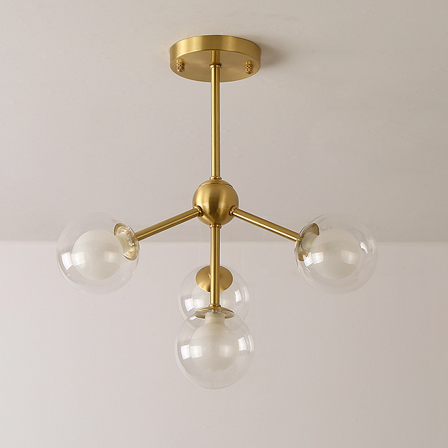 Modern 4 Light Semi Flush Ceiling light in Brass with Globe Glass Shade