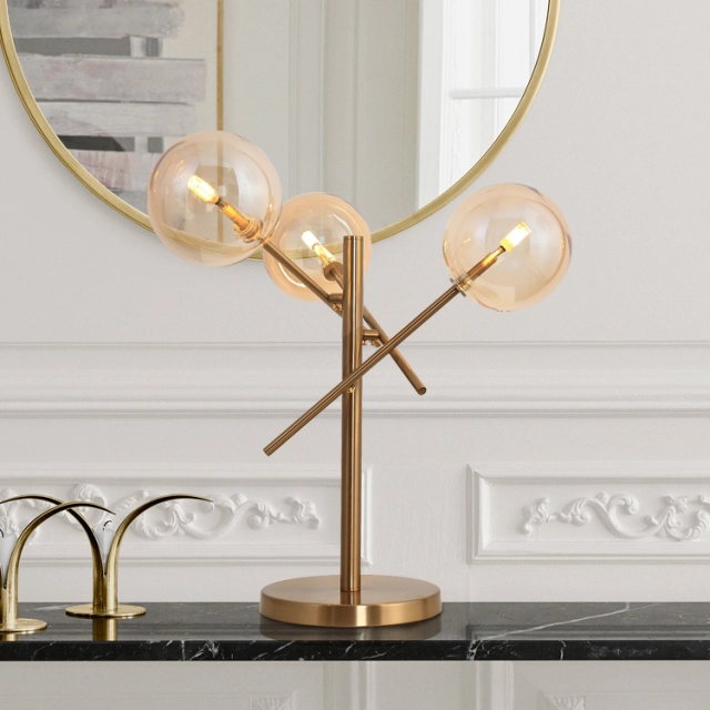 Modern 3 Light Table Lamp in Gold with Glass Globes