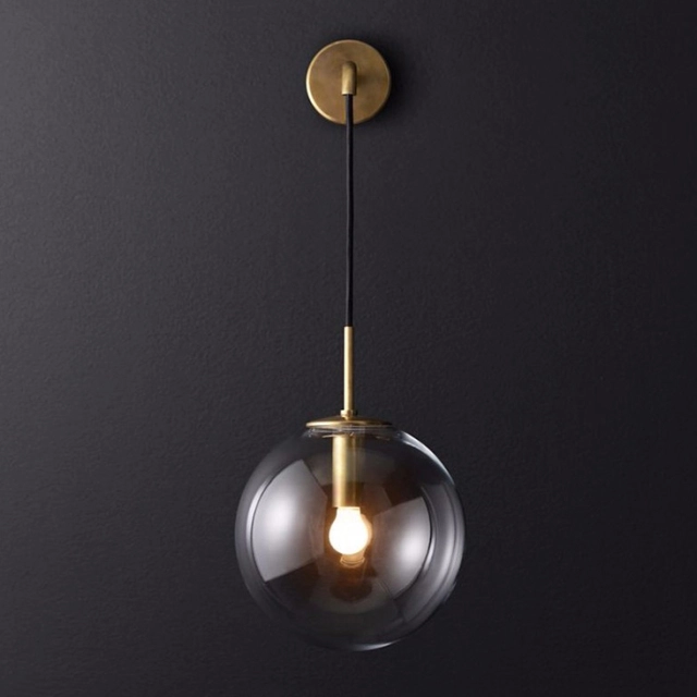 Modern Style 7.8'' Wide Hanging Wall Sconce with Clear Globe Glass Shade in Gold