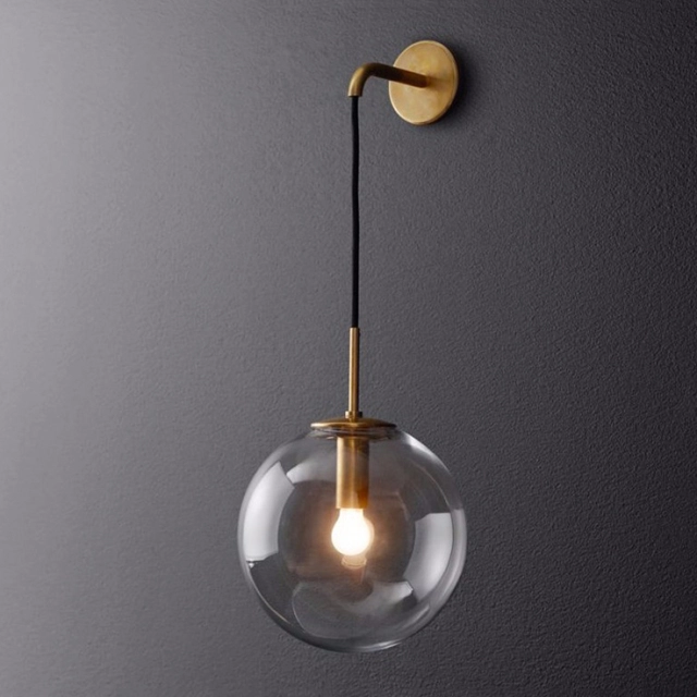 Modern Style 7.8'' Wide Hanging Wall Sconce with Clear Globe Glass Shade in Gold