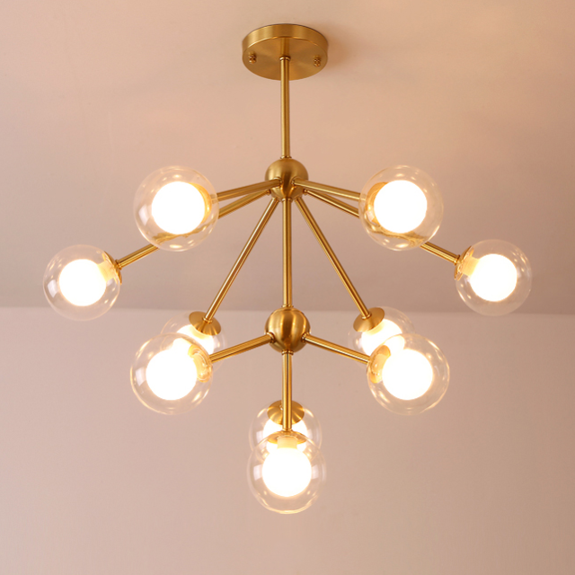 Modern 4 Light Semi Flush Ceiling light in Brass with Globe Glass Shade