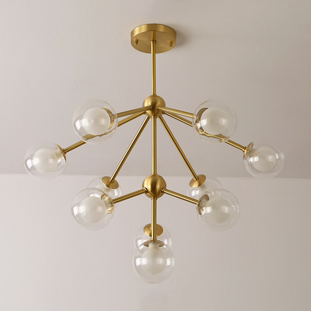 Modern 4 Light Semi Flush Ceiling light in Brass with Globe Glass Shade