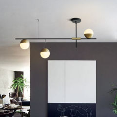 Mid-Century Modern 3 Light Linear Ceiling Light in Black and Brass with Glass Globes for Dining Room Kitchen Island Restaurant