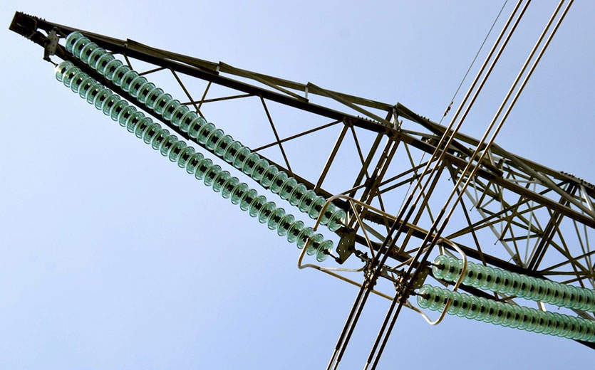 Glass insulator strings installed on an overhead transmission line