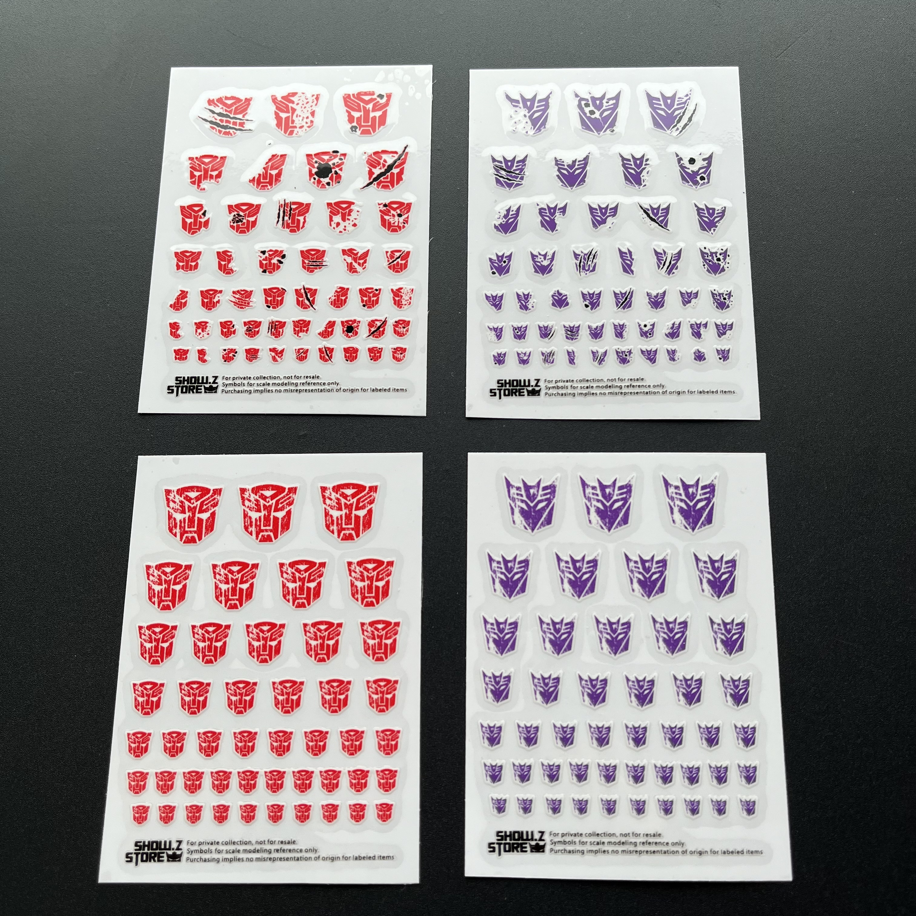Reviews of Transformers Symbol Battle Damaged Sticker Set of 4 w/ White  Background 2.0 Version, image size:3024x3024
