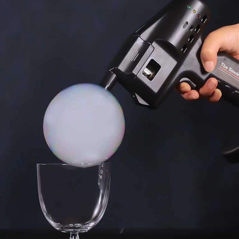 Hand held smoked bubble gun