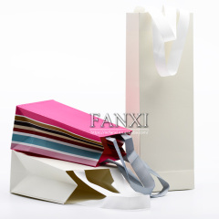 FANXI OEM Wholesale White Paper Pacckaging Bags For Gift Jewelry Cloth Shop Party Favors Custom Printed Paper Shopping Bag
