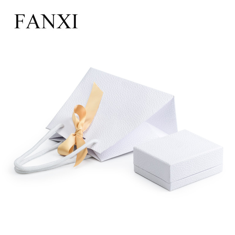 FANXI Wholesale Custom Logo Paper Shopping Bags With Ribbon And Handle For Jewelry Watch Cloth Cosmetic Packaging Luxury White Paper Gift Bag