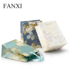 FANXI Custom Jewelry Shop Party Favors Shopping Bags For Jewellery Watch Cloth Cosmetic Embossed Pattern Flower Paper Gift Bag
