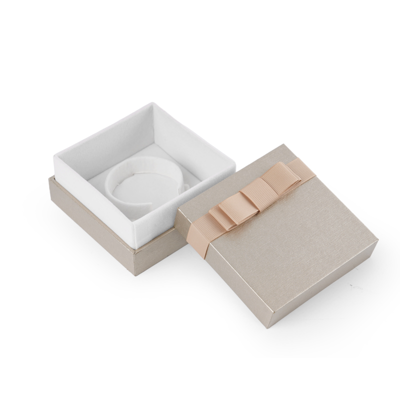 Champagne colour paper jewellery packing box with ribbon bowknot