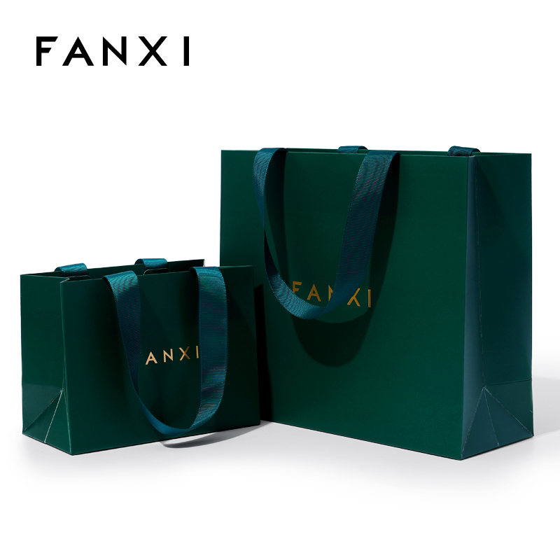 Dark green paper jewelry bag with matching ribbon